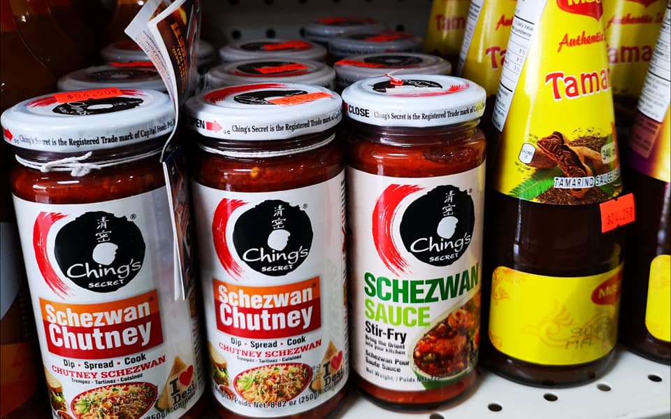 Close-up of imported spice packages and seasoning mixes