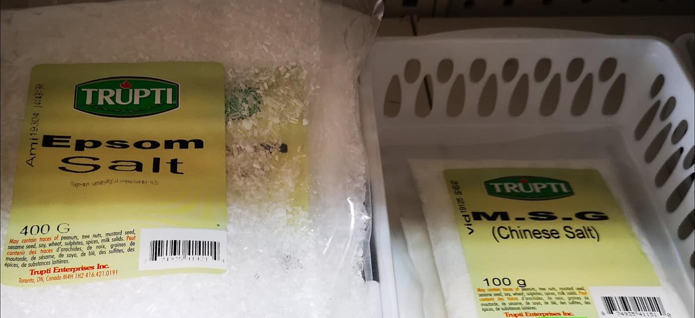 Shelves displaying a variety of imported sauces and cooking essentials