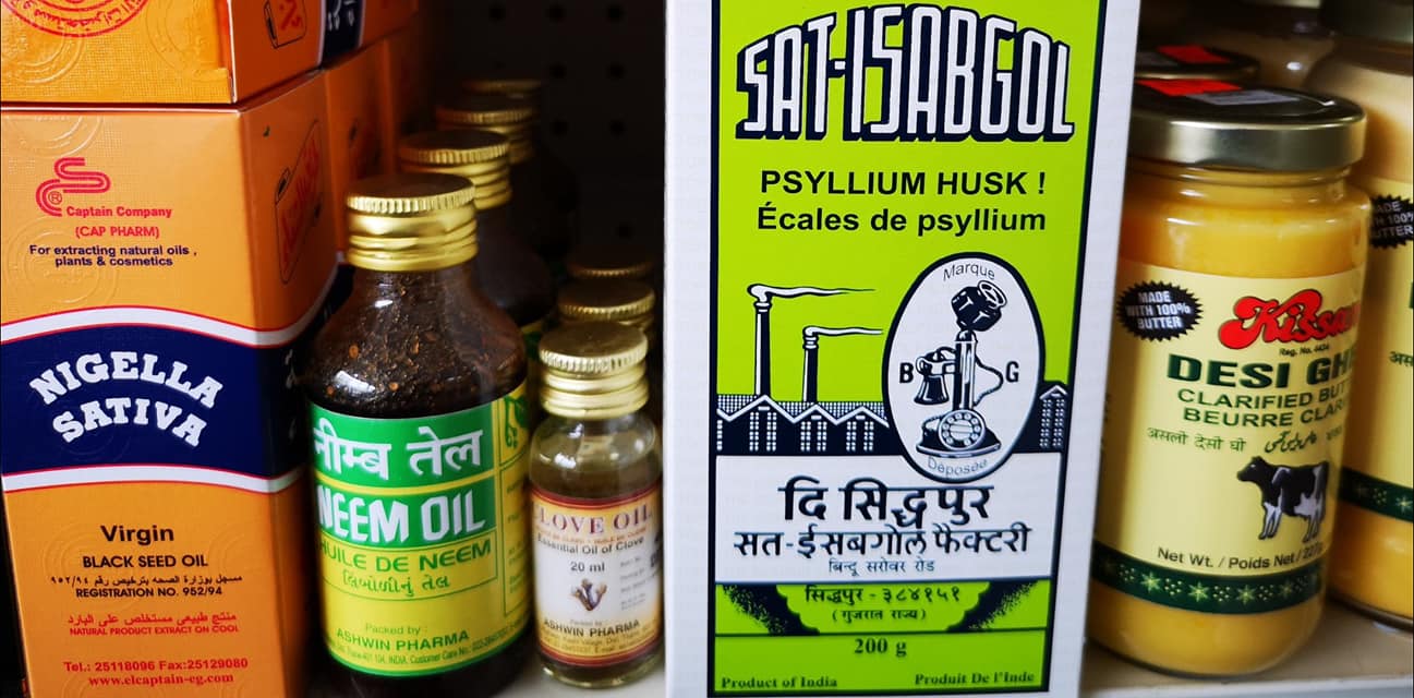 Specialty dried goods and grains in bags on lower shelves