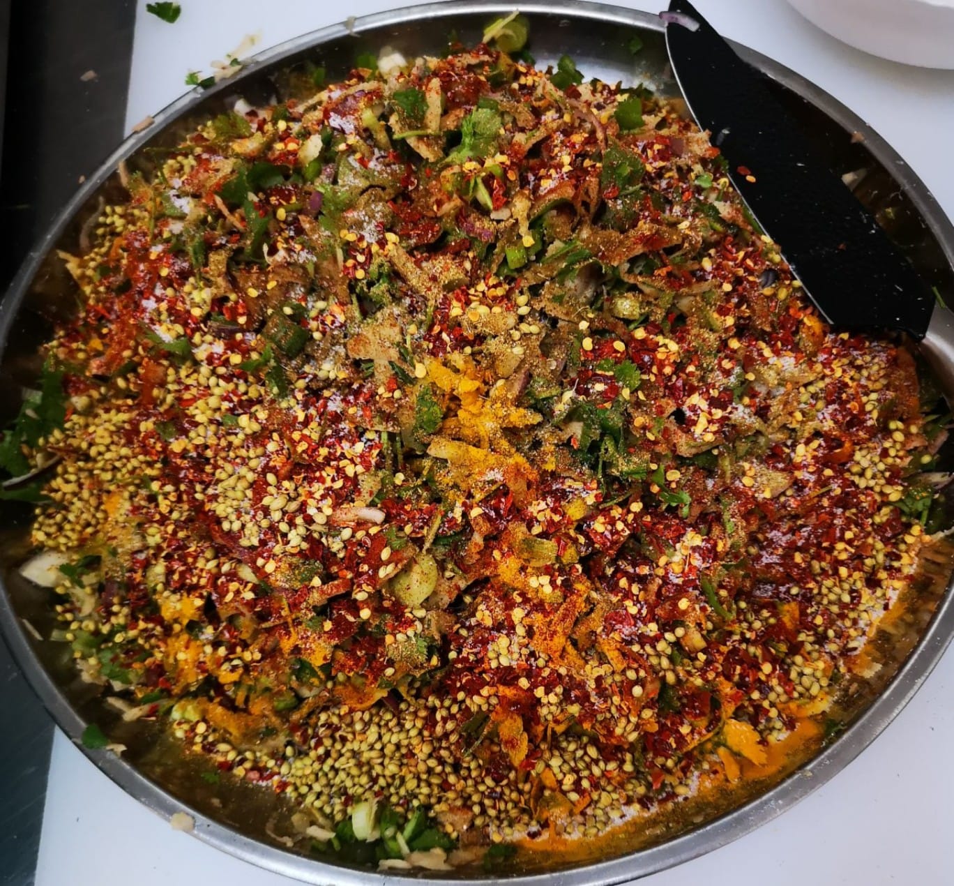Freshly prepared spiced dish at the hot food counter